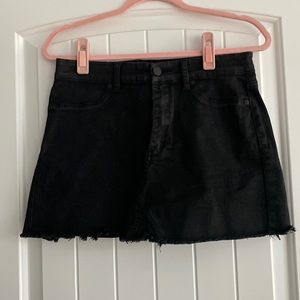 Black denim mini skirt